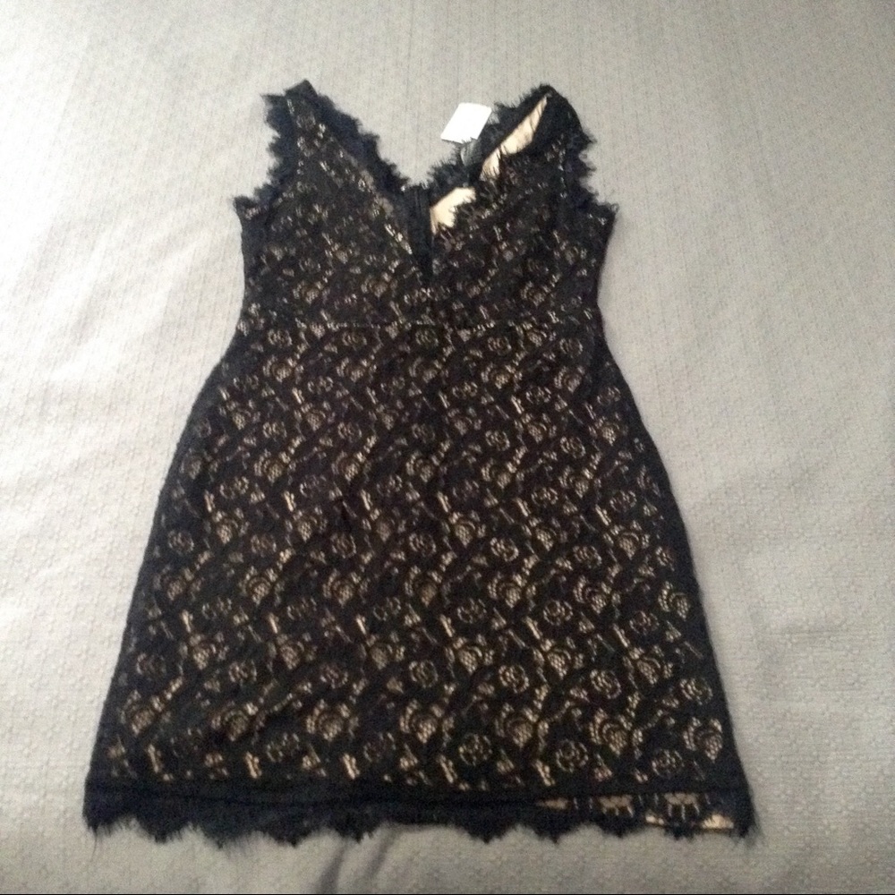 New black and nude lace dress size medium